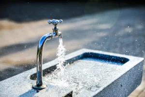 Water reuse systems with activated carbon