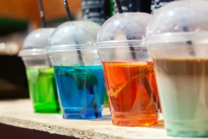 Beverage clarification with activated carbon filtration