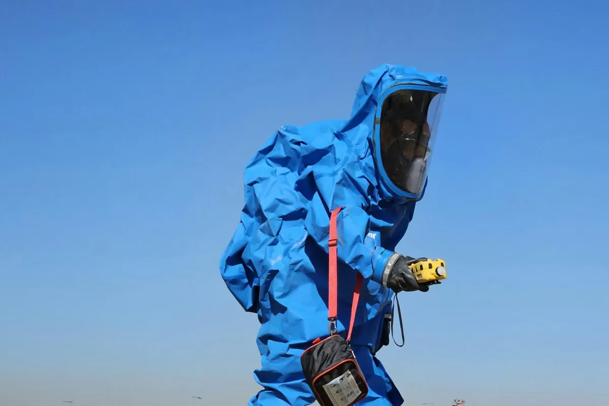 Chemical protective suits using activated carbon