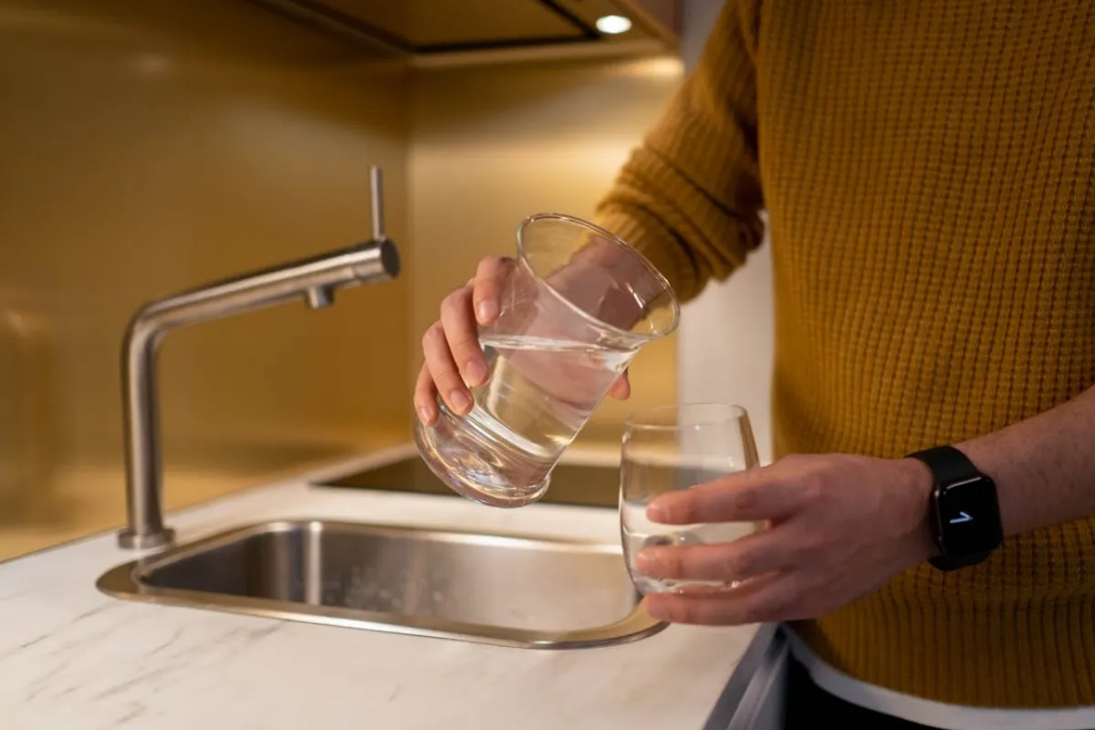 Point-of-use water filtration with activated carbon