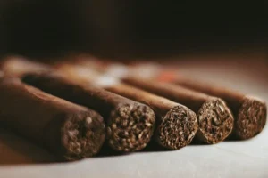 Tobacco processing with activated carbon
