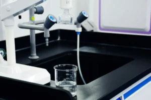 Ultrapure water production using activated carbon