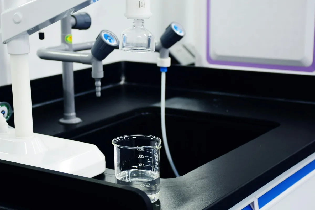 Ultrapure water production using activated carbon